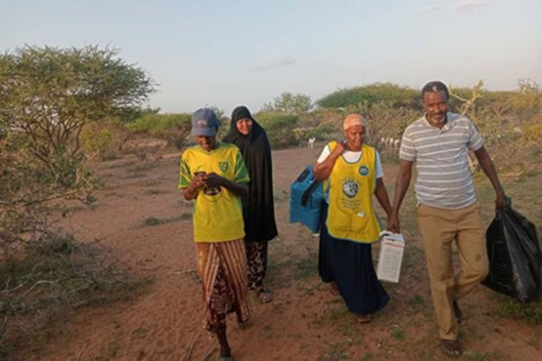 Sahra Ali and other volunteers take the measles vaccine in Elram Village, Mandera County. Credit: Mohamed Ali, Mandera County press.