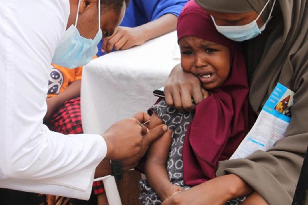A child receives a jab of the MMR vaccine in Mandera County. Credit: Ibrahim Adan, The Standard.