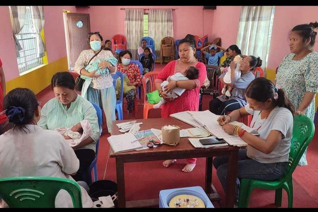Mothers bring their children to a health post in Dharan for vaccination. Credit: Chhatra Karki.