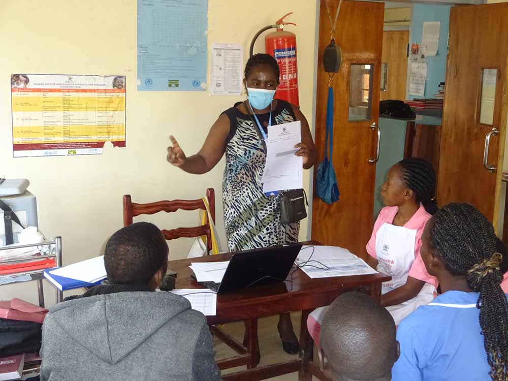 Namaalwa conducting an onsite mentorship session at Busota HCIII in Kamuli municipality. 