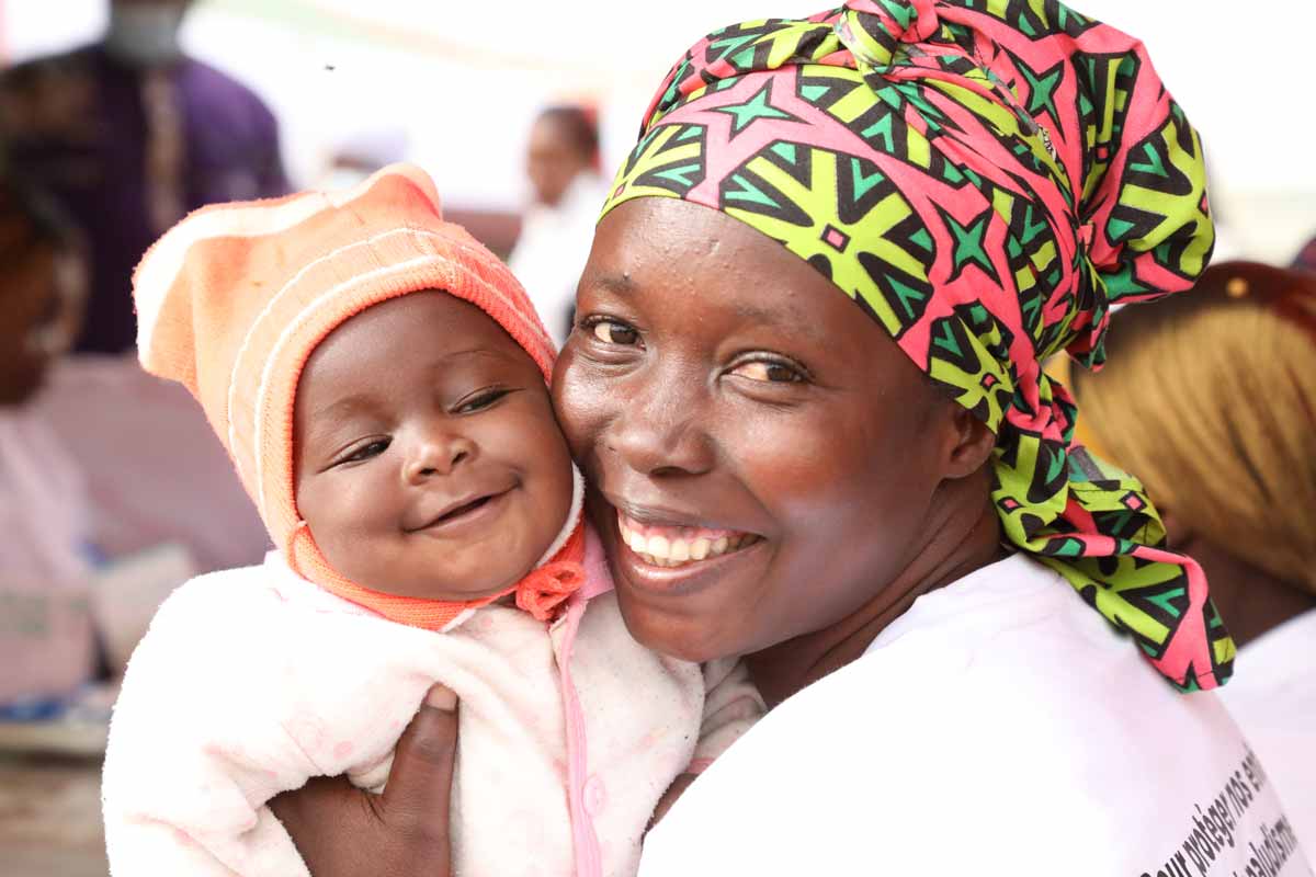 A mother and baby at a malaria vaccination in Burkina Faso, 2024. Credit: Gavi/2024/Arnauld Yalgwueogo